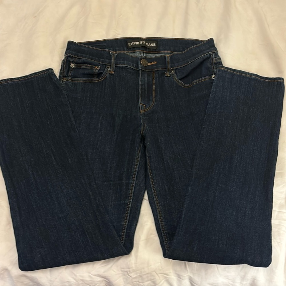 Express dark wash, skinny mid-rise jeans. Size 6R.